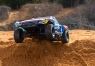 Радиоуправляемая модель шорт-корса Traxxas Maxx Slash 1:10 4WD 6S Brushless RTR c аппаратурой TQi™ 2.4 GHz TSM (цвет Рок-н-Ролл)